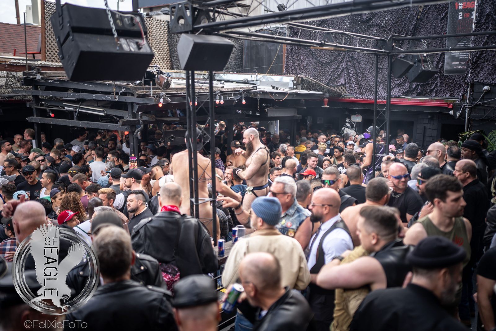 A packed crowd of big guys out together in San Francisco, photographed by Felix Xie